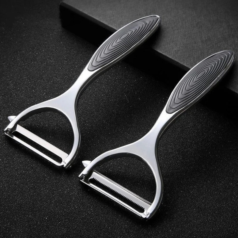 Shop a versatile Stainless Steel Vegetable Peeler. Perfect for peeling potatoes, carrots, and fruits