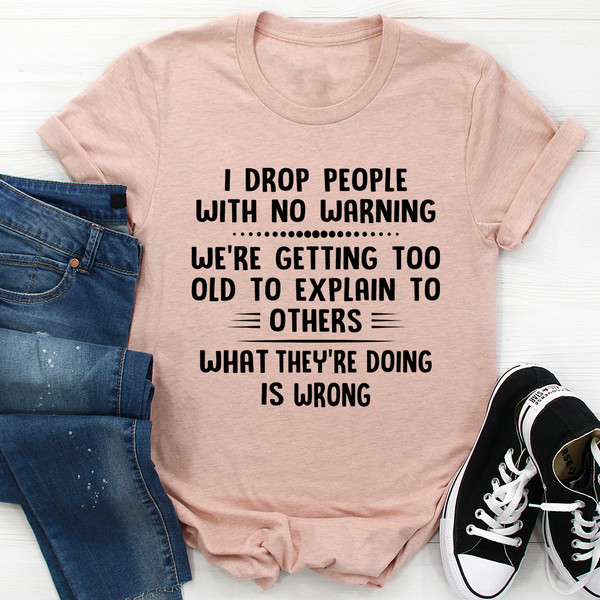I Drop People With No Warning Tee
