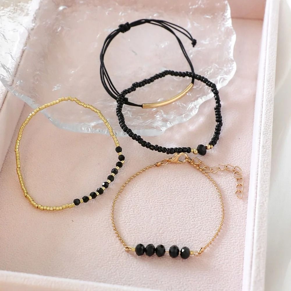 4 Piece Black Glass Stone Bracelet Set