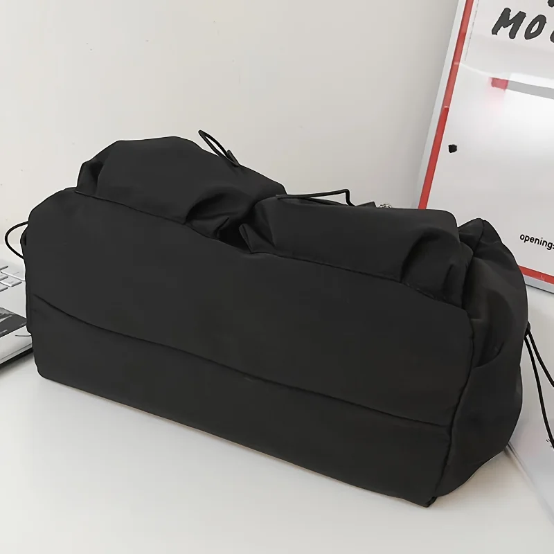 Fashionable Crossbody Bag with Drawstring Accent Spacious Zippered Closure & Stylish Bag Charm
