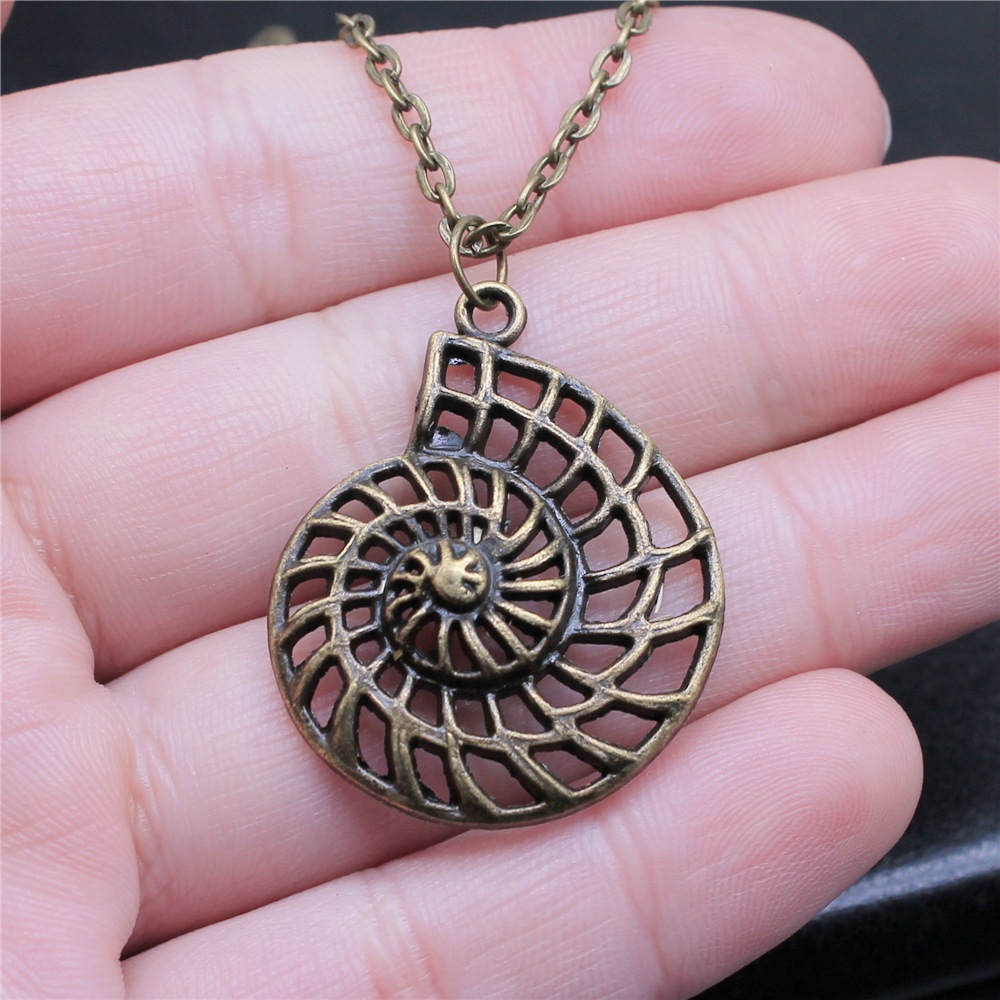Vintage Bronze Swirl Pendant Necklace for Women Timeless Antique Jewelry