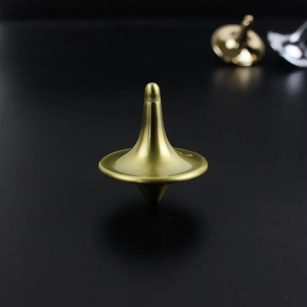 Metal Gyro Precision Silver Spinning Top with Movie Totem Print