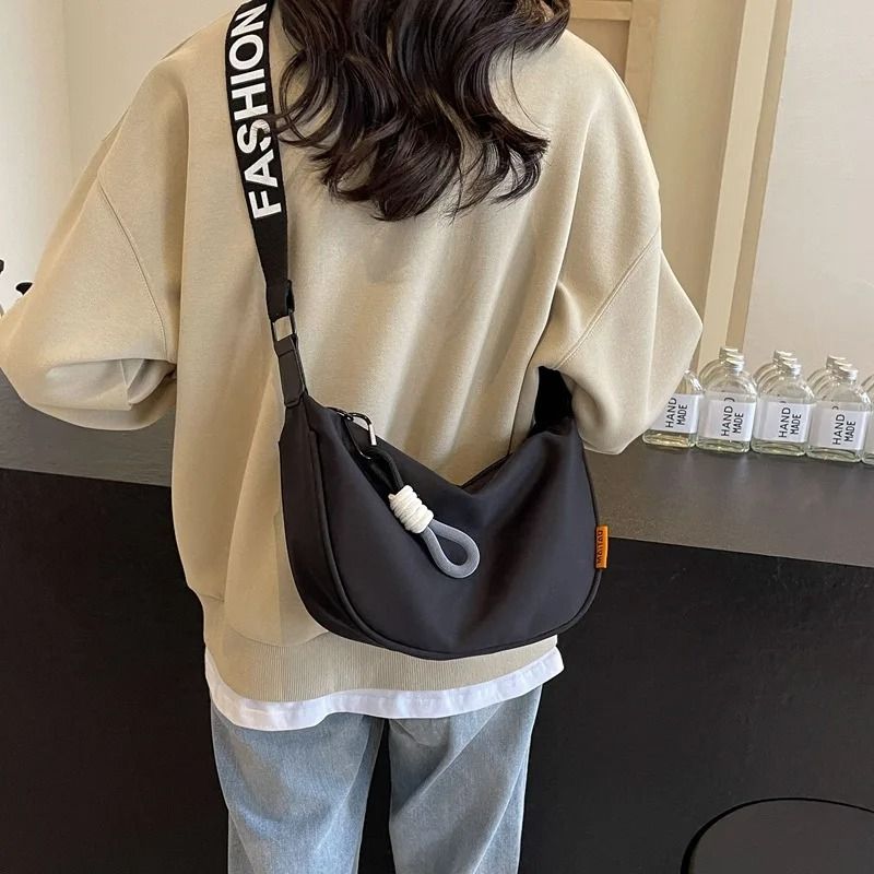 Women Dumpling Crossbody Bag with Wide Shoulder Strap and Zip Closure