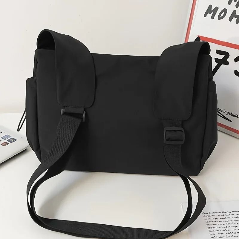 Fashionable Crossbody Bag with Drawstring Accent Spacious Secure Zipper Closure