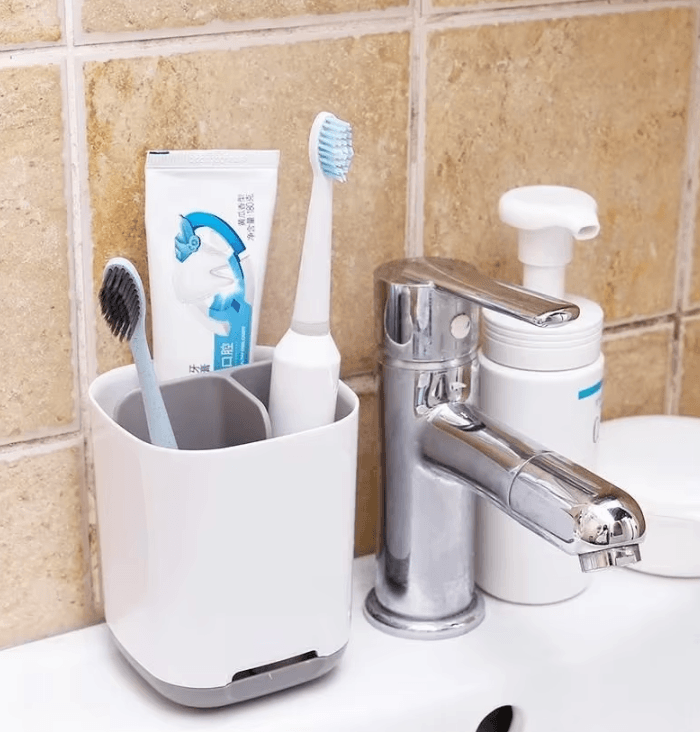 Toothbrush Holder Rack – Plastic Electric Toothbrush & Toothpaste Storage Organizer for Bathroom