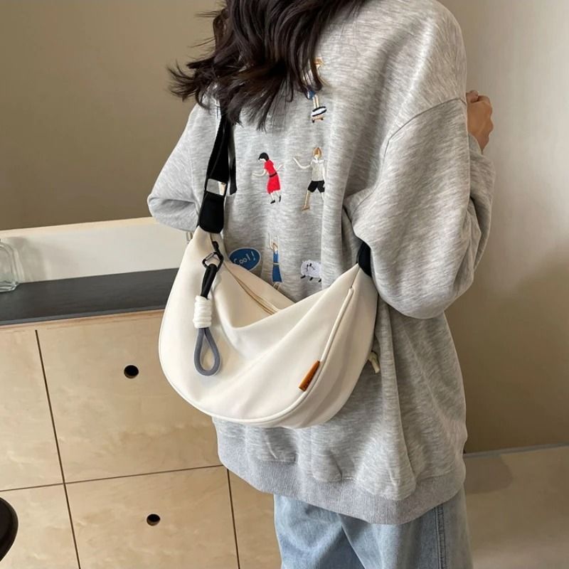 Women Dumpling Crossbody Bag with Wide Shoulder Strap and Zip Closure