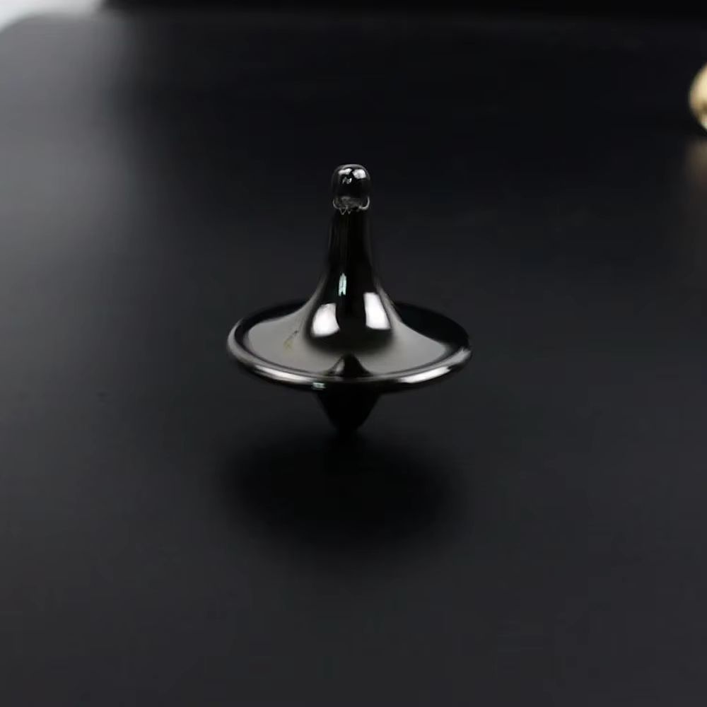 Metal Gyro Precision Silver Spinning Top with Movie Totem Print