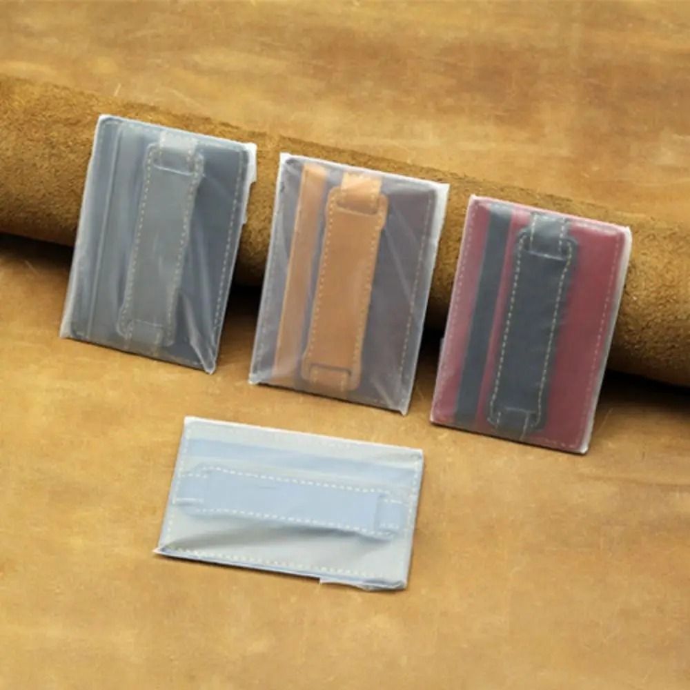 Adhesive Phone Wallet with Integrated Grip Strap