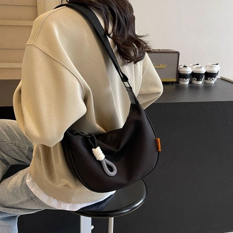 Women Dumpling Crossbody Bag with Wide Shoulder Strap and Zip Closure