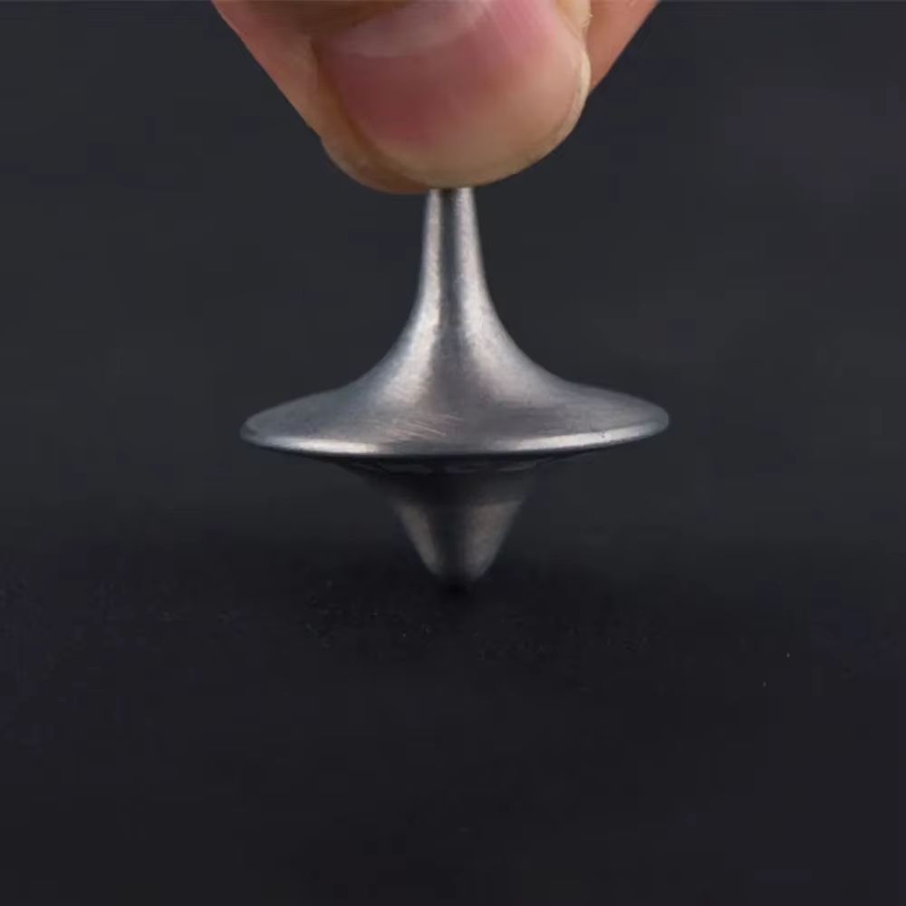 Metal Gyro Precision Silver Spinning Top with Movie Totem Print
