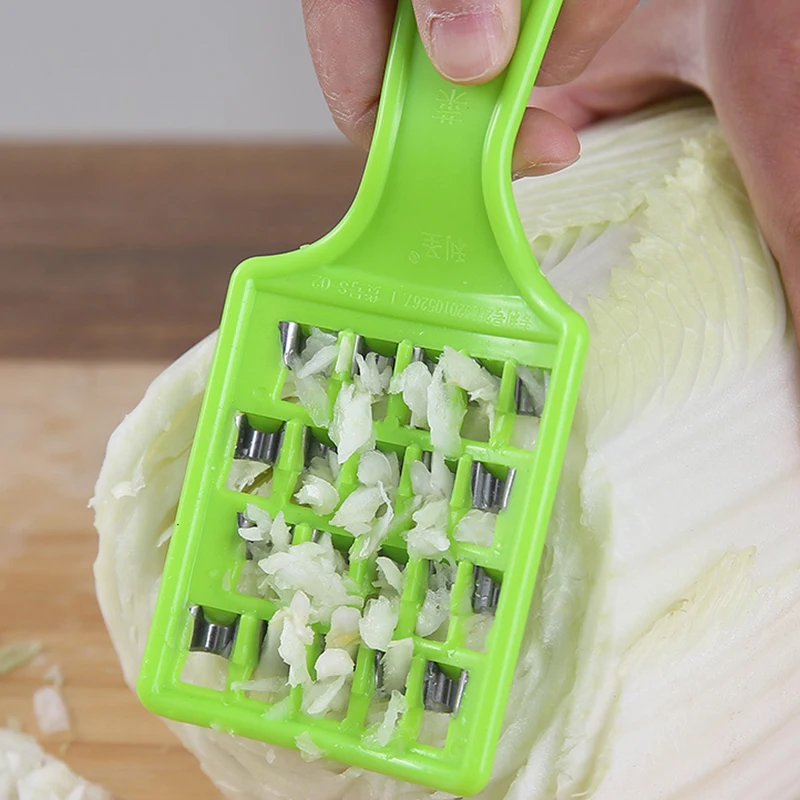 Compact Multi Function Vegetable Cutter & Cabbage Slicer with Fruit Peeler