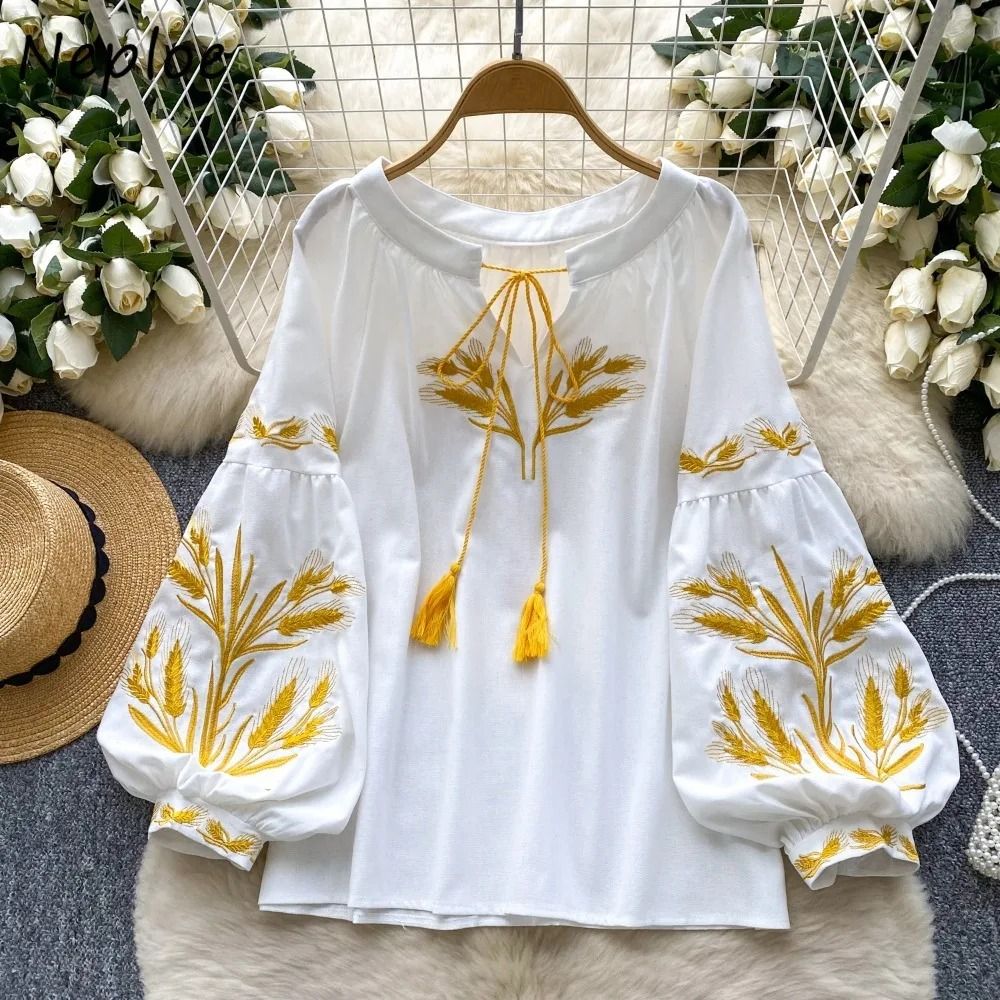 Women Vintage Ethnic Style Embroidered Blouse with Lace Up Neck and Lantern Sleeves