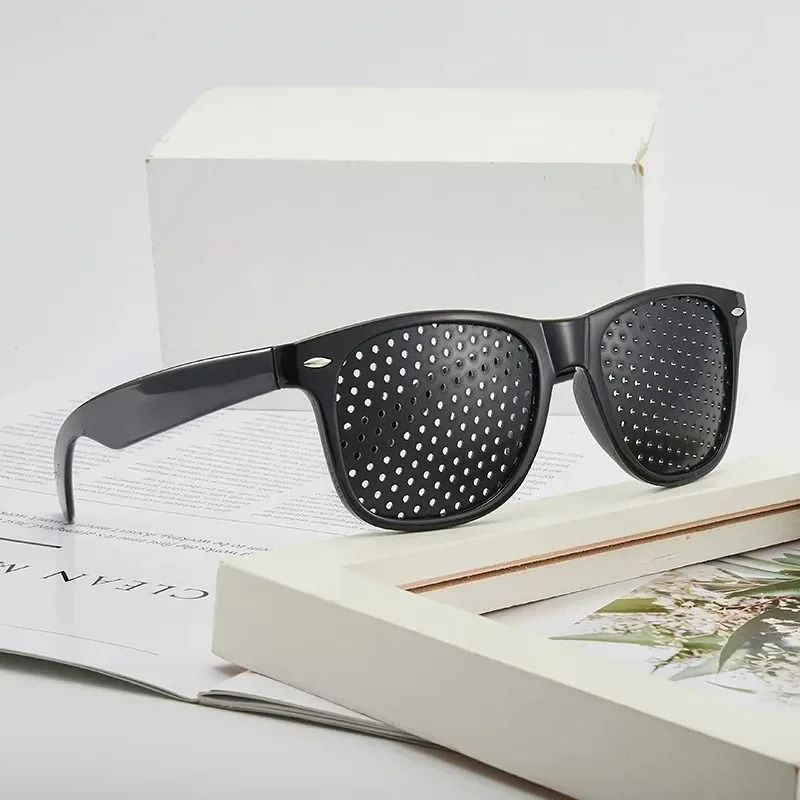 Improving Vision Pinhole Glasses for Eye Training and Focus Correction