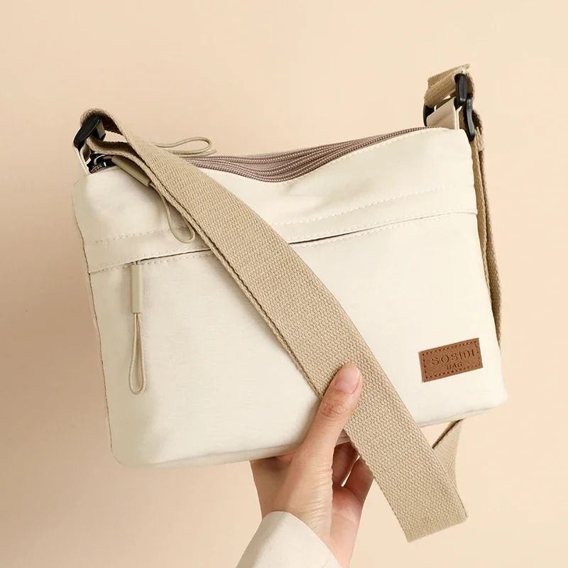 Womens Canvas Crossbody Bag with 3 Main Pockets and Adjustable Shoulder Strap