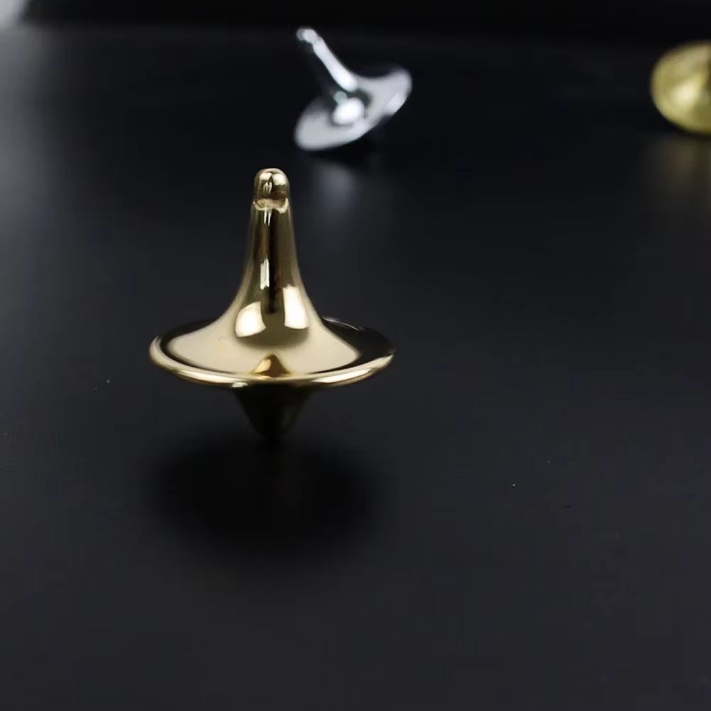 Metal Gyro Precision Silver Spinning Top with Movie Totem Print