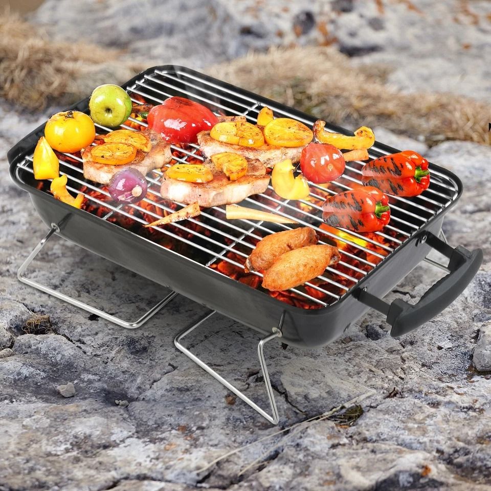 Compact Portable Charcoal Grill for Outdoor Adventures Ideal for Backyard, Camping, and Travel