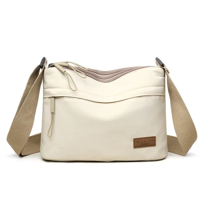 Womens Canvas Crossbody Bag with 3 Main Pockets and Adjustable Shoulder Strap