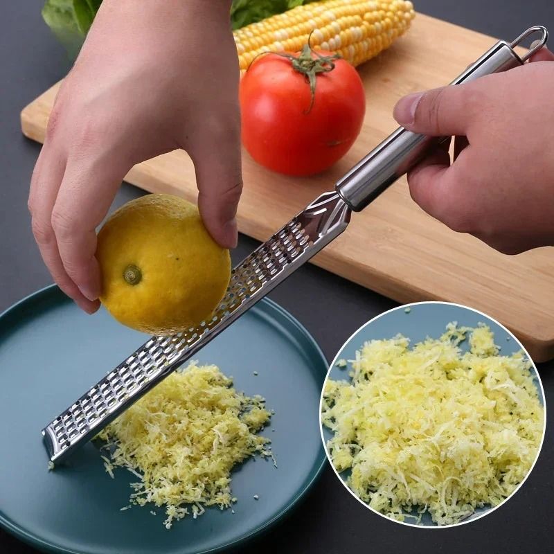 Handheld Stainless Steel Cheese and Garlic Grater for Kitchen Use