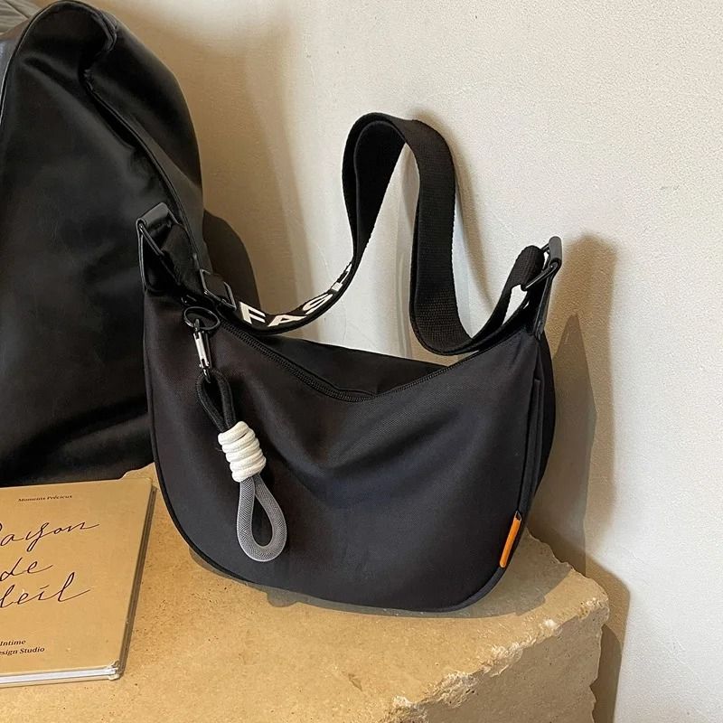 Women Dumpling Crossbody Bag with Wide Shoulder Strap and Zip Closure
