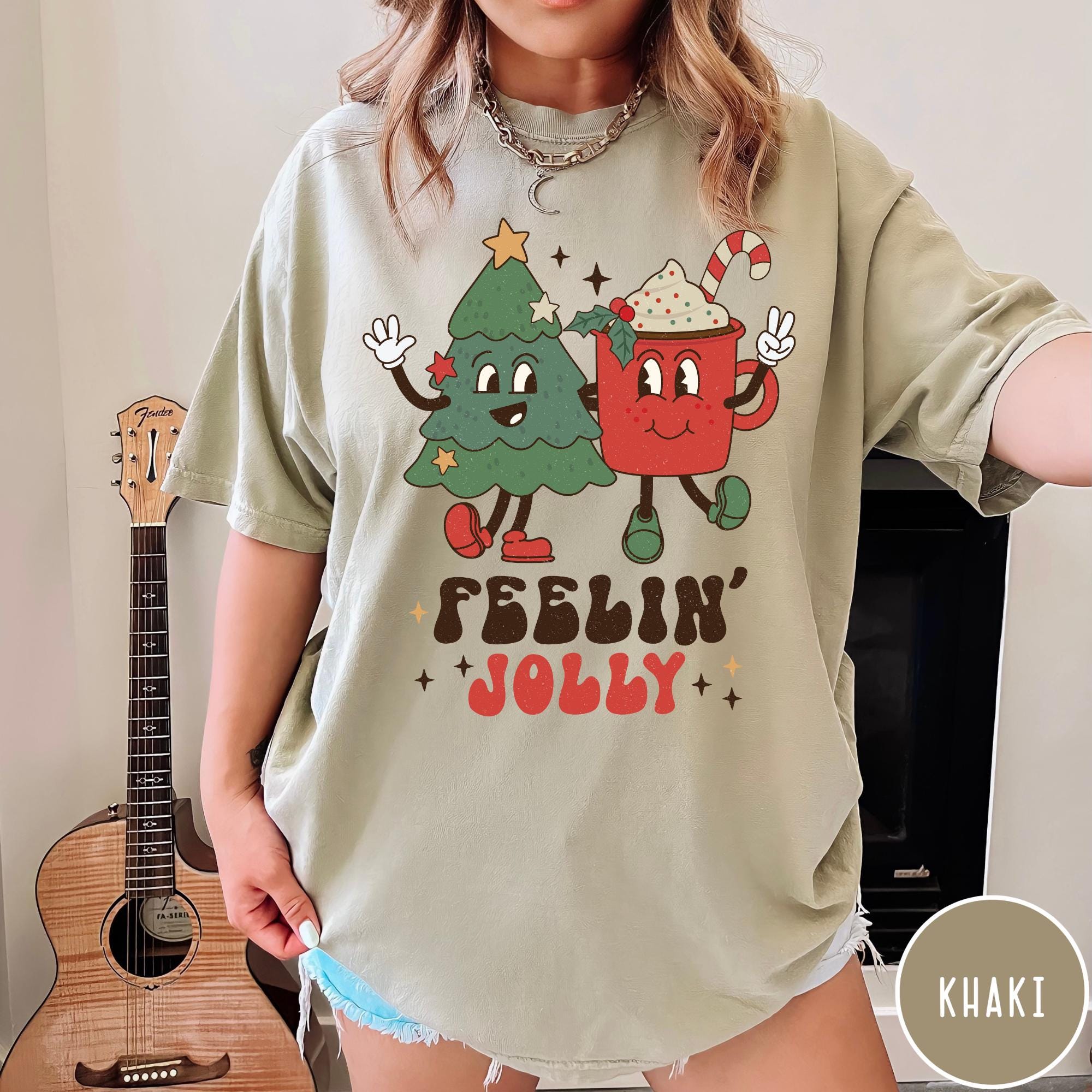 Cute Christmas shirt with jolly characters. Fun holiday graphic tee perfect for festive outfits and gifts.