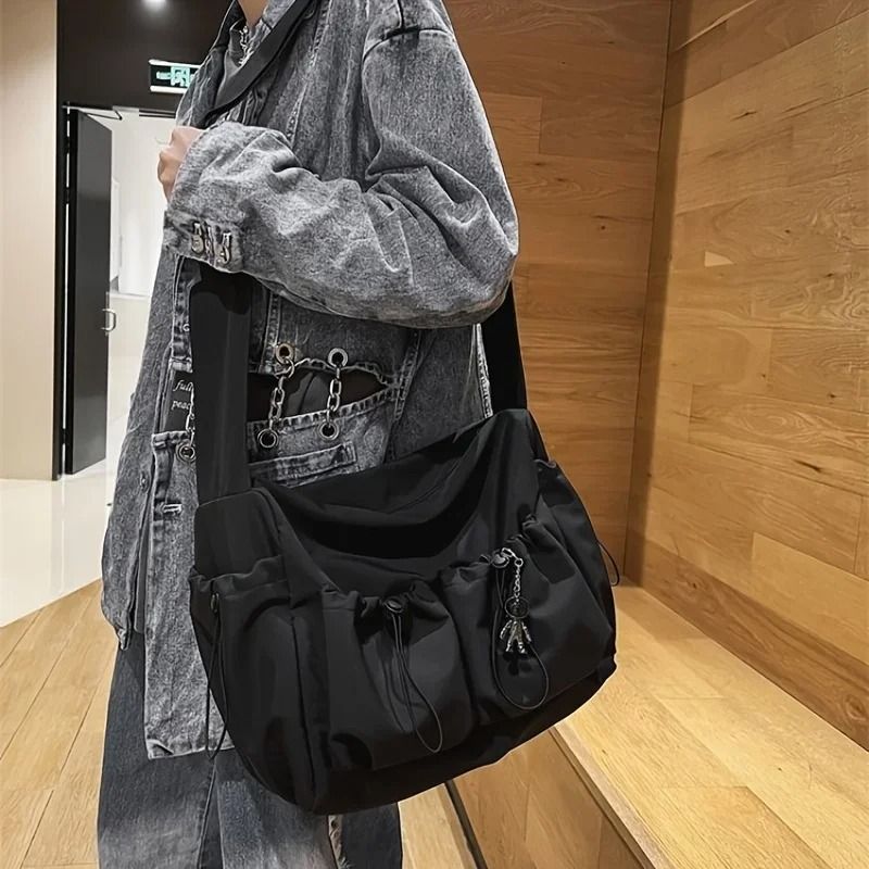 Fashionable Crossbody Bag with Drawstring Accent Spacious Secure Zipper Closure