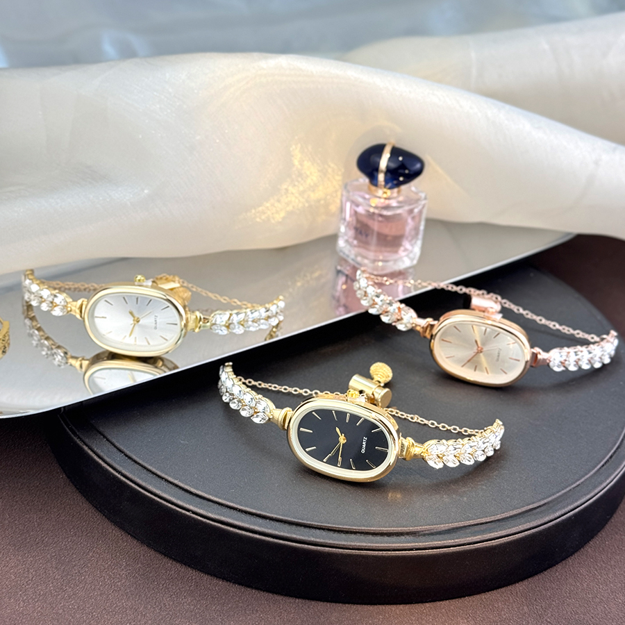 Best-selling Elegant Leaf Embedded Diamond Quartz Watch, New Oval Pull Cord Fashion Bracelet