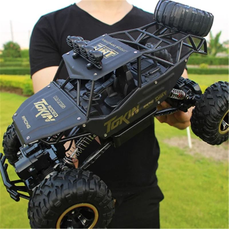 4WD RC Off-Road Car with Shockproof Suspension and 2.4GHz Remote Control – 1:12 / 1:16 Scale