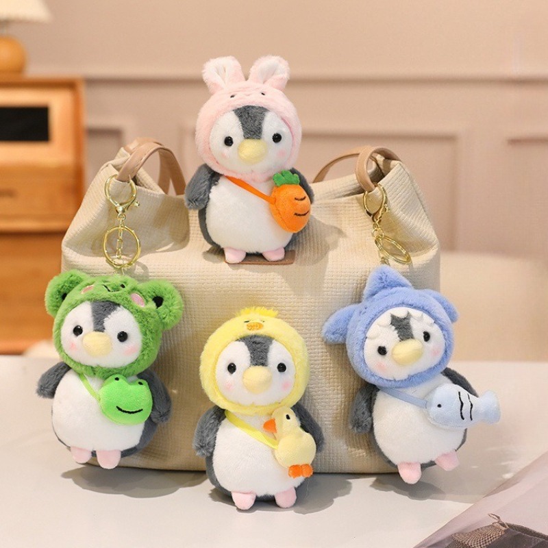 Cute Penguin Plush Keychain with Hats Super Soft Plushie Pendant Bag Ornament Ideal Gift for Couples and Penguin.