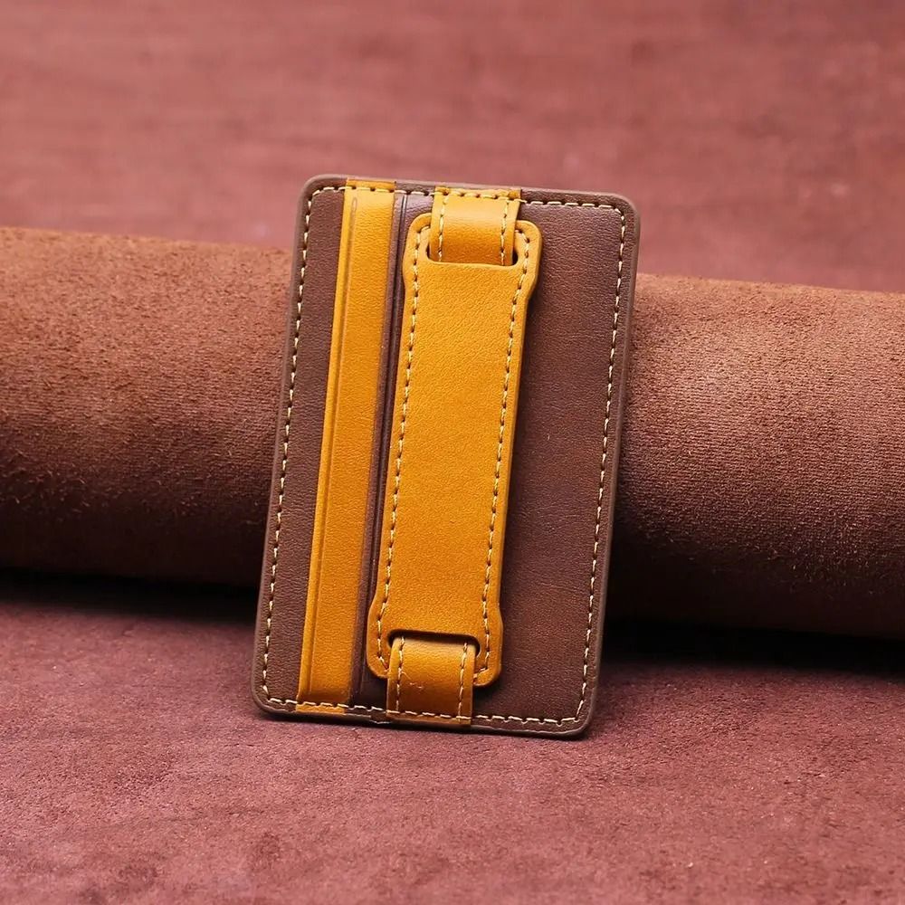 Adhesive Phone Wallet with Integrated Grip Strap