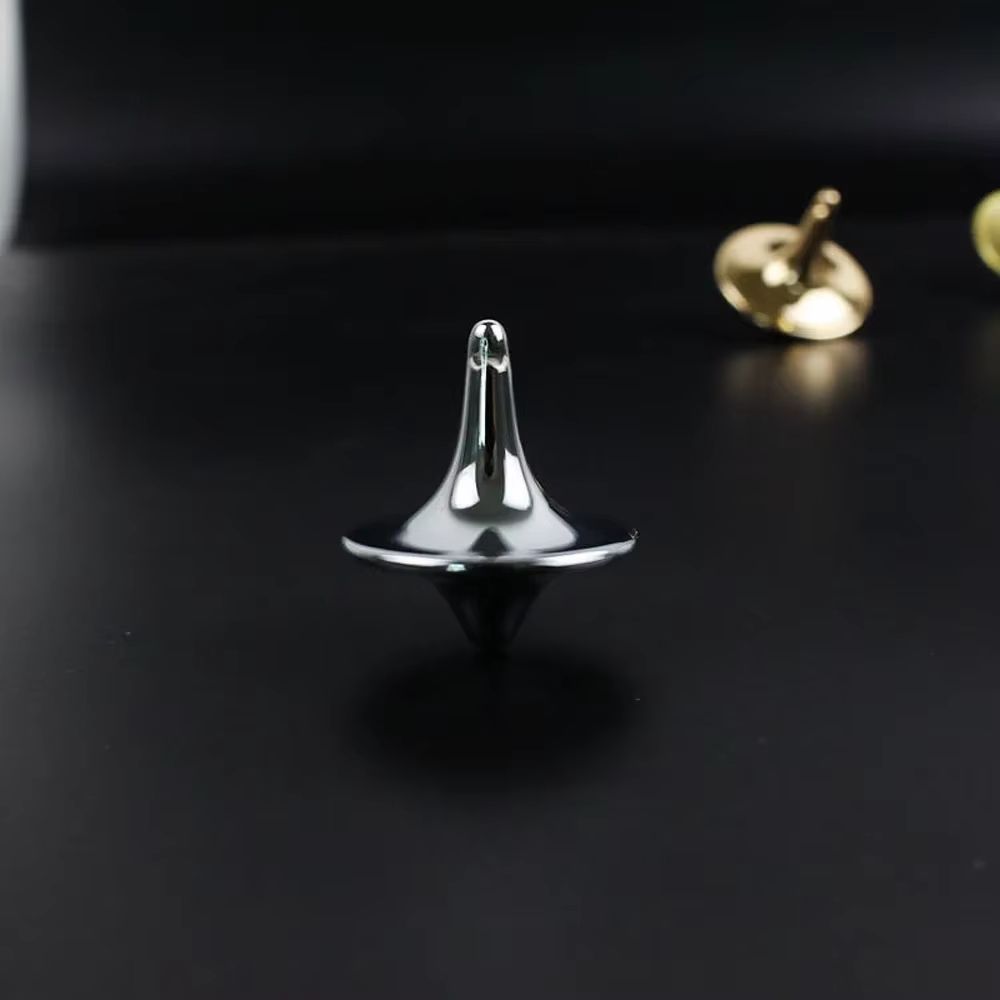 Metal Gyro Precision Silver Spinning Top with Movie Totem Print