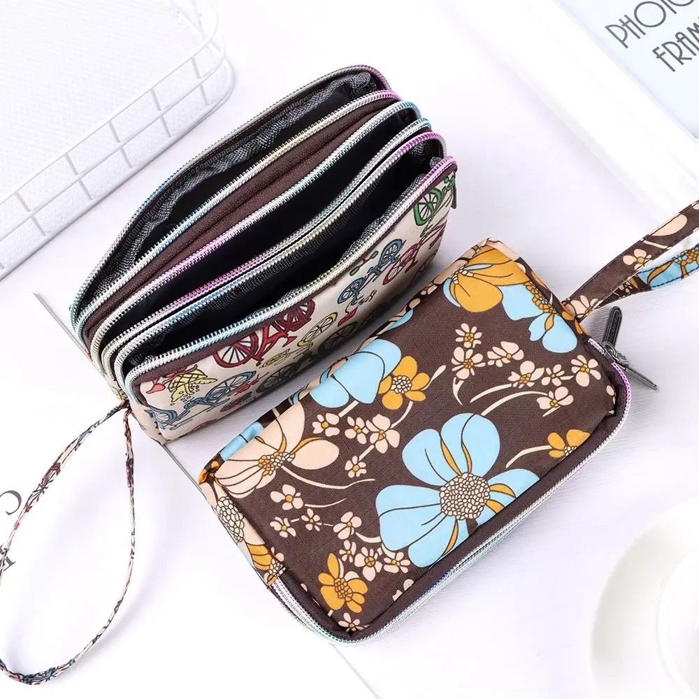 Three-Layer Floral Canvas Wristlet Bag