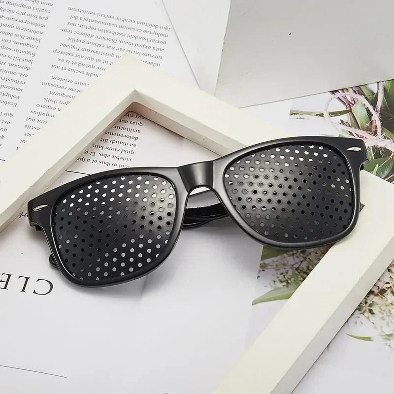 Improving Vision Pinhole Glasses for Eye Training and Focus Correction