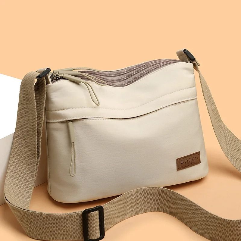Womens Canvas Crossbody Bag with 3 Main Pockets and Adjustable Shoulder Strap