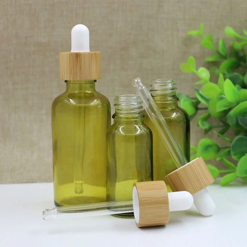 Olive Green Glass Dropper Bottle – Refillable Travel Container for Essential Oils and Cosmetics