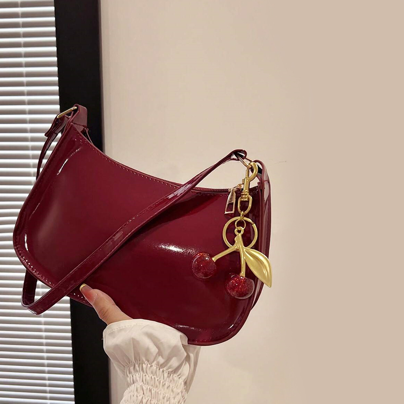 Womens Leather Handbag with Cherry Pendant Versatile Fashion Solid Color Shoulder Bag for Casual Commuting