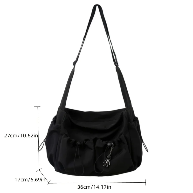 Fashionable Crossbody Bag with Drawstring Accent Spacious Zippered Closure & Stylish Bag Charm