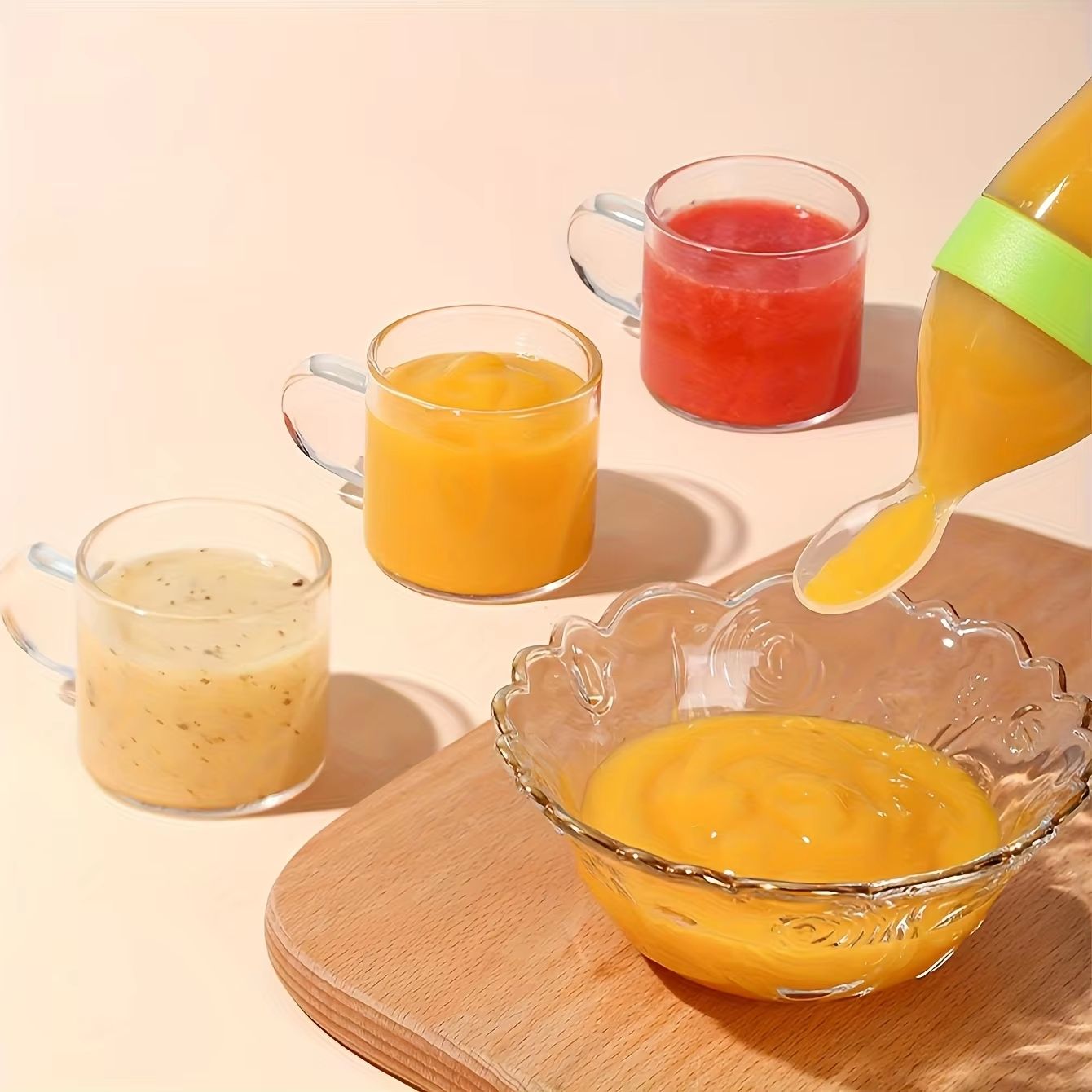 9-Piece Silicone Baby Feeding Set with Dinosaur Rotating Fruit Feeder, Squeeze Bottle and S/M/L Silicone Bags