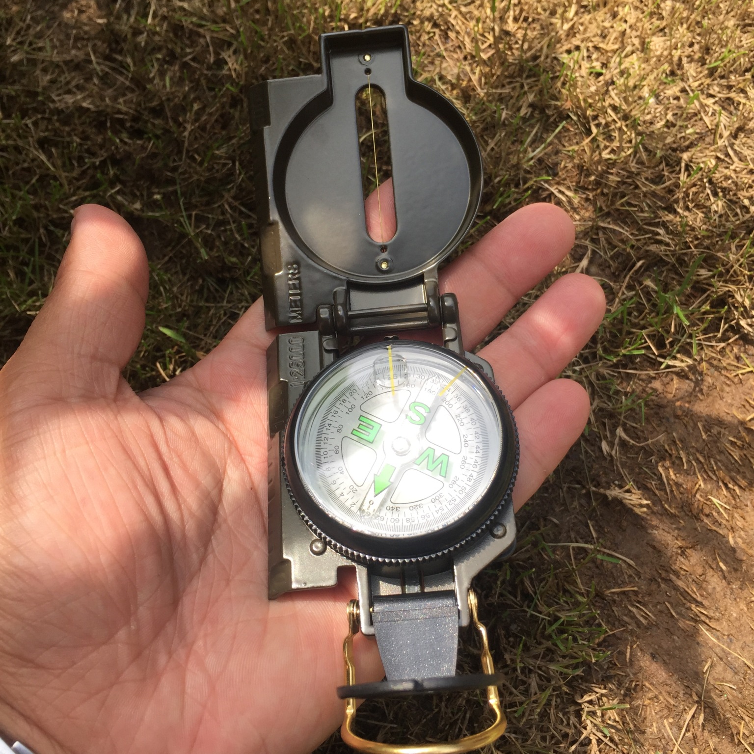 A compact, essential tool for every outdoor adventurer, combining precision with versatility.